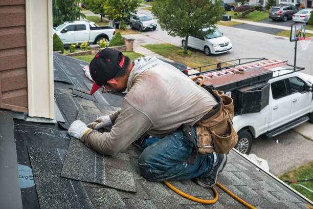 Professional Storm Damage Roof Repair technician working in Orfordville, WI